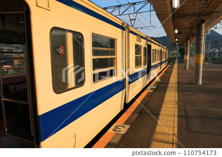 JR Kyushu, Sasebo Line train window view from Sasebo Station to Hayaki Station (early morning) JR Kyushu, Sasebo Line train window view from Sasebo Station to Hayaki Station (early morning) 110754173