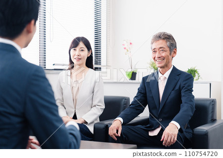 Business people smiling and having business negotiations 110754720