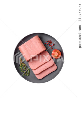 Delicious canned pink ham with salt, spices and herbs 110755973