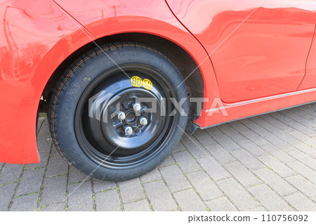 car with spare tire 110756092