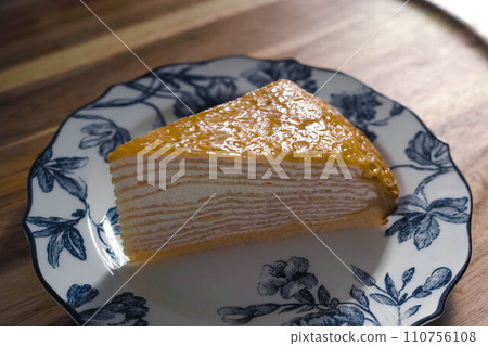 Sunbeams filtering through the leaves and mille crepe 110756108