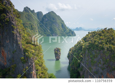 Aerial top view of Khao Phing Kan, Ko Ta Pu, Phang Nga, lush green trees from above in tropical forest in national park in summer season. Natural landscape background. 110756359