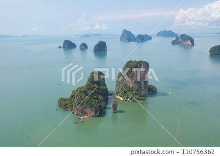 Aerial top view of Khao Phing Kan, Ko Ta Pu, Phang Nga, lush green trees from above in tropical forest in national park in summer season. Natural landscape background. 110756362