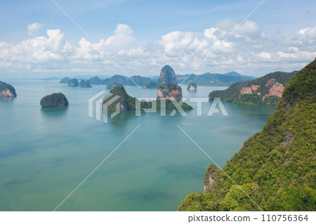 Aerial top view of Khao Phing Kan, Ko Ta Pu, Phang Nga, lush green trees from above in tropical forest in national park in summer season. Natural landscape background. 110756364
