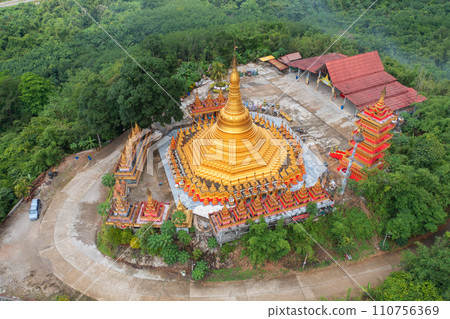 Wat Bang Thong, Krabi, Southern Temple. The pagoda is a buddhist temple in urban city town, Thailand. Thai architecture landscape background. Tourist attraction landmark. 110756369