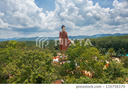 Wat Bang Thong, Krabi, Southern Temple. The pagoda is a buddhist temple in urban city town, Thailand. Thai architecture landscape background. Tourist attraction landmark. 110756370