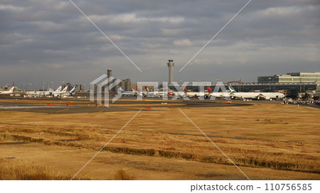 Haneda Airport Terminal 3 seen from Haneda Innovation City Footbath Sky Deck 110756585