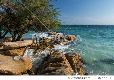 seascape through tree and stone arch in summer, Ko Man Klang seascape through tree and stone arch in summer, Ko Man Klang 110756595