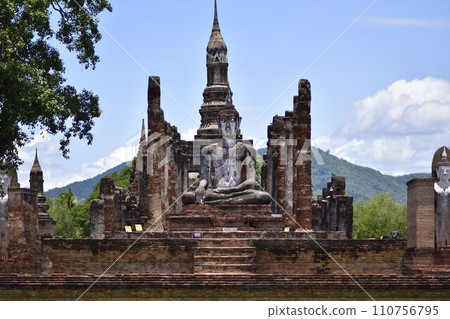 Buddha statue at Sukhothai ruins Buddha statue at Sukhothai ruins 110756795