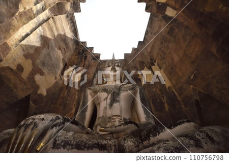 Buddha statue symbolizing Sukhothai ruins Buddha statue symbolizing Sukhothai ruins 110756798