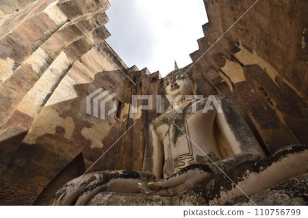 Buddha statue symbolizing Sukhothai ruins Buddha statue symbolizing Sukhothai ruins 110756799