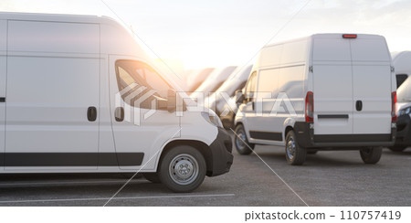 Express delivery, shipping service concept. Delivery vans in a row in the rays of sunset or dawn. 110757419