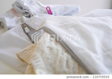 Laundry net used to wash woolen clothes, white background 110759503