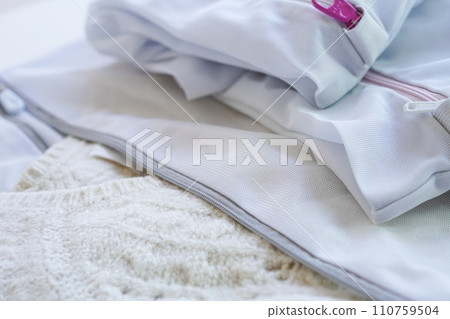 Laundry net used to wash woolen clothes, white background 110759504