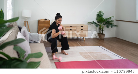 Fat women exercise healthily at home on leisurely day happily. overweight wellness at home concept 110759943