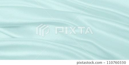 Smooth elegant blue silk or satin luxury cloth texture as abstract background. Luxurious background design 110760330
