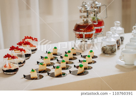 Dessert buffet with delicious sweet bakery and coffee-snack with stylish banks of lemonade and tea 110760391