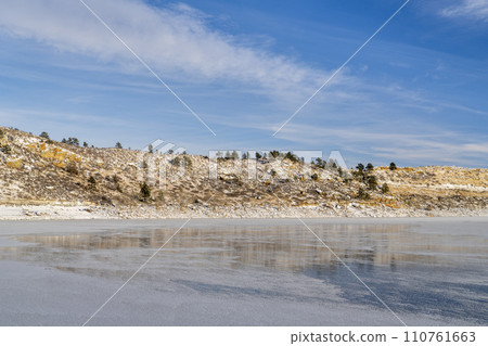 winter scenery of northern Colorado foothills - frozen Horsetooth Reservoir 110761663