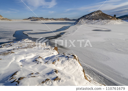 winter scenery of northern Colorado foothills - frozen Horsetooth Reservoir 110761679