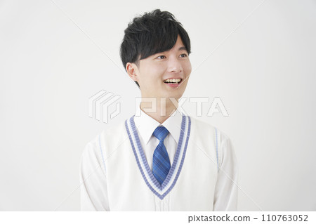 Portrait of a smiling high school boy, white background 110763052