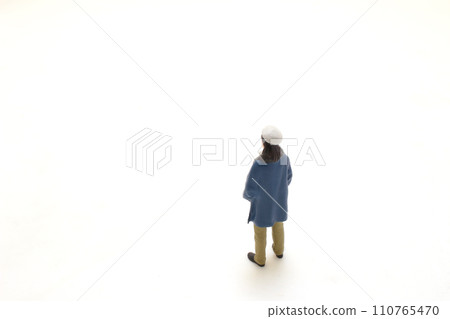 small figurine of an artist with beret on white. small figurine of an artist with beret on white. 110765470