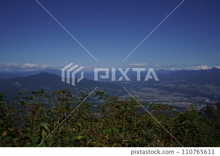 Shibukawa City, Gunma Prefecture, looking towards Numata from the summit of Mt. Mizusawa, October 2, 2023 110765611