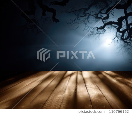 Empty wooden table with moonlight and intricate shadow from tree branches  110766162