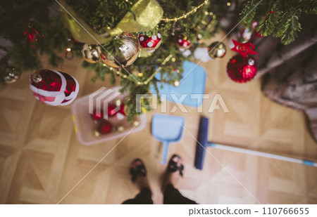 Aftermath of Joy: Decorations Down, Broom Up, A Snapshot of Cleanup 110766655