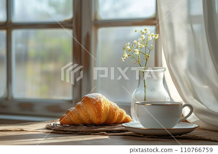 AI-generated content. Fresh croissant and a coffee cup on wooden kitchen table lit by the rays of bright morning sun. Healthy eating concept. Romantic breakfast with beautiful morning garden view. AI-generated content. Fresh croissant and a coffee cup on wooden kitchen table lit by the rays of bright morning sun. Healthy eating concept. Romantic breakfast with beautiful morning garden view. 110766759