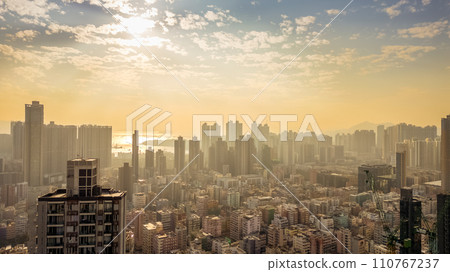 Modern skyline at sunset in empty urban area. Jan 7 2024 Modern skyline at sunset in empty urban area. Jan 7 2024 110767237