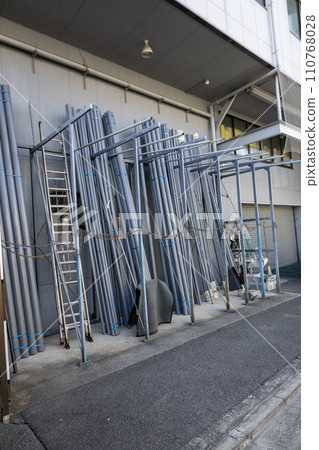 Plastic piping materials propped up Plastic piping materials propped up 110768028