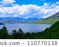 Snowy mountains, lake and blue sky 110770138