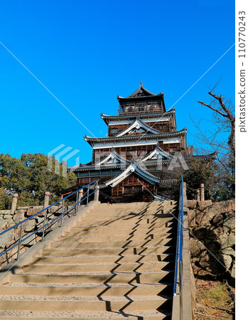 Castle tower with a clear blue sky in the background Castle tower with a clear blue sky in the background 110770243