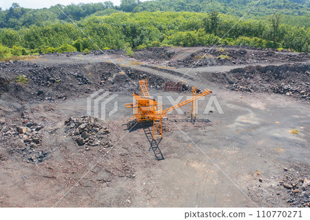 Aerial top view of ground in the land with sand in factory industry for construction site. Arid pattern texture background. Bulldozer tractor 110770271