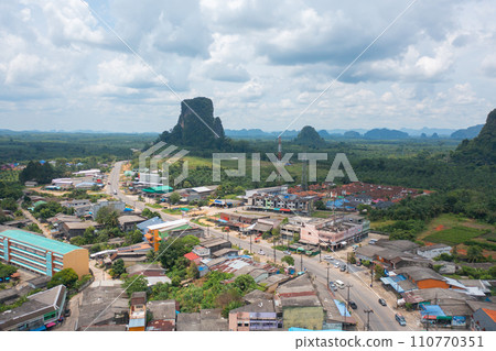 Aerial top view of Samet Nangshe, Phang Nga with city town, lush green trees from above in tropical forest in national park in summer season. Natural landscape. Pattern texture background. 110770351