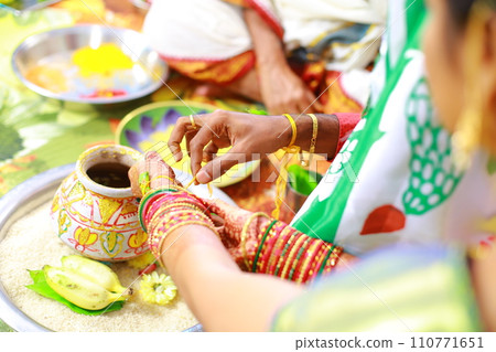 Prayer at Traditional Hindu wedding ceremony 110771651