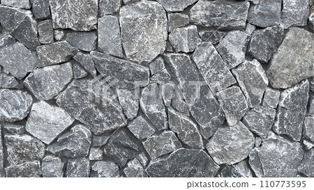 Horizontal background image of light gray irregularly shaped masonry surface Horizontal background image of light gray irregularly shaped masonry surface 110773595
