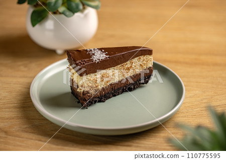 Triple chocolate mousse cake Triple chocolate mousse cake 110775595