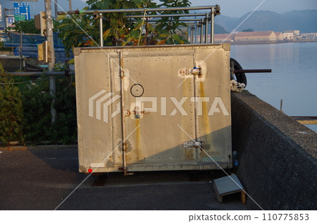 A warehouse located at the river mouth A warehouse located at the river mouth 110775853