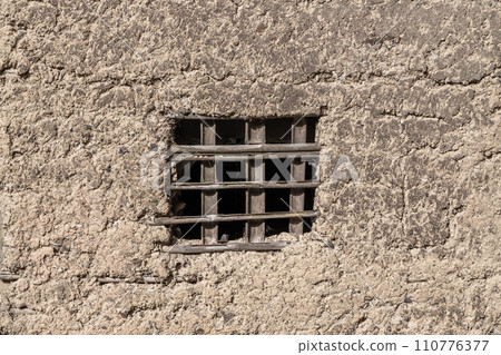 traditional earthen walls of old houses 110776377