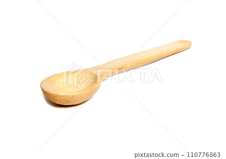 wooden spoon isolated on the white 110776863