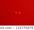 red hearts on red background 110776878