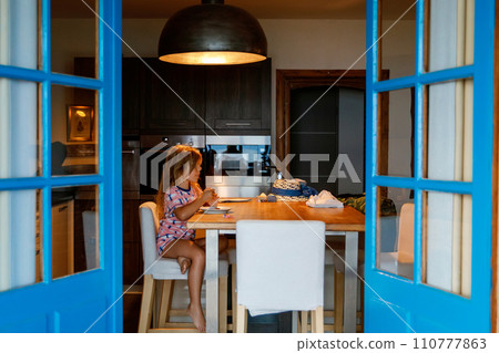 Three children watching sunrise on terrace or balcony. Two kids boys and preschool girl watch sun on horizon. Happy children relaxing near beach, family enjoying beautiful view. Three children watching sunrise on terrace or balcony. Two kids boys and preschool girl watch sun on horizon. Happy children relaxing near beach, family enjoying beautiful view. 110777863