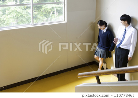 High school student consulting with friends High school student consulting with friends 110778465