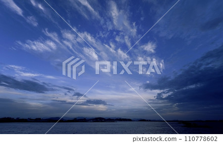 Evening sky and port with various clouds spread out / Summer / Ultra wide angle / Sky-based / 230712pm Evening sky and port with various clouds spread out / Summer / Ultra wide angle / Sky-based / 230712pm 110778602