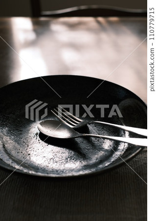 Finished plate, spoon and fork Finished plate, spoon and fork 110779715
