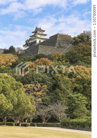 Marugame, Kagawa, castle tower and stone walls seen from the ruins of Marugame Castle Palace Marugame, Kagawa, castle tower and stone walls seen from the ruins of Marugame Castle Palace 110780095