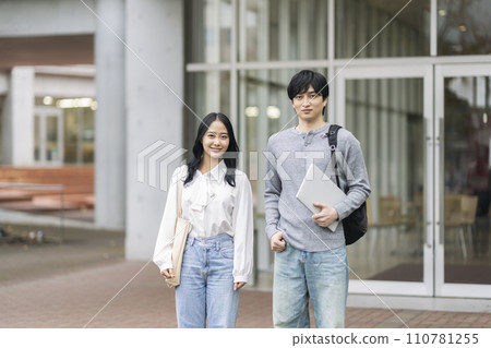 College student image: Young men and women smiling looking at the camera 110781255