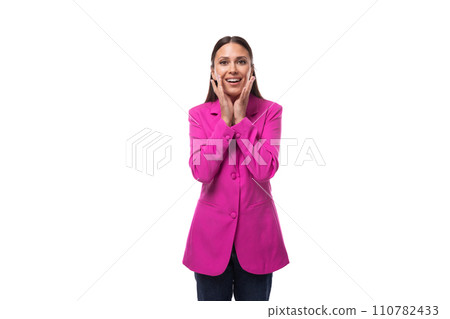 young charismatic well-groomed brunette business woman dressed in a pink chic suit writes a message 110782433