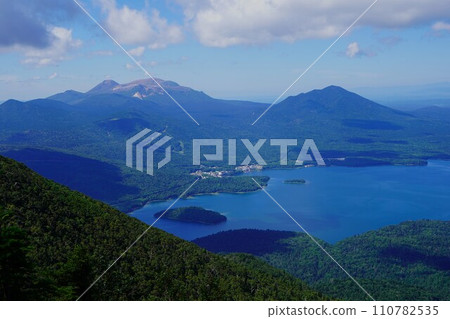 Lake Akan, Mt. Meakandake, and Mt. Fupushi from the 6th station of Mt. Oakandake 110782535